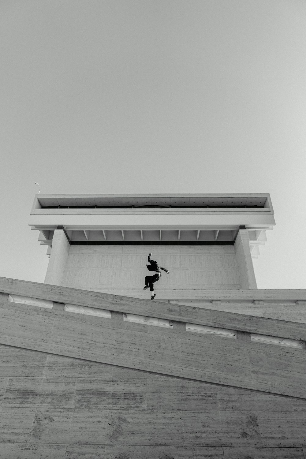 a man riding a skateboard down the side of a ramp