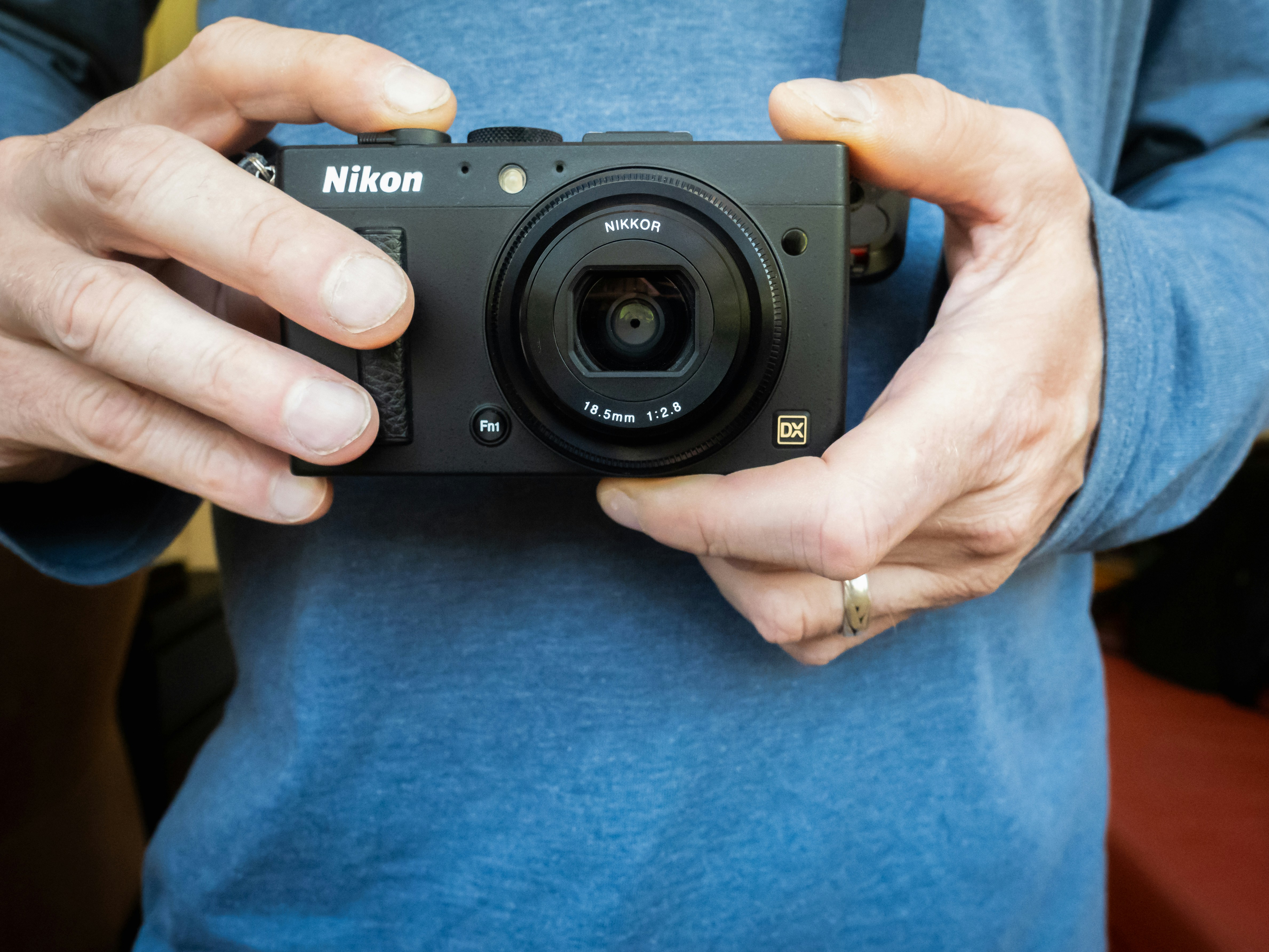 a person holding a camera in their hands