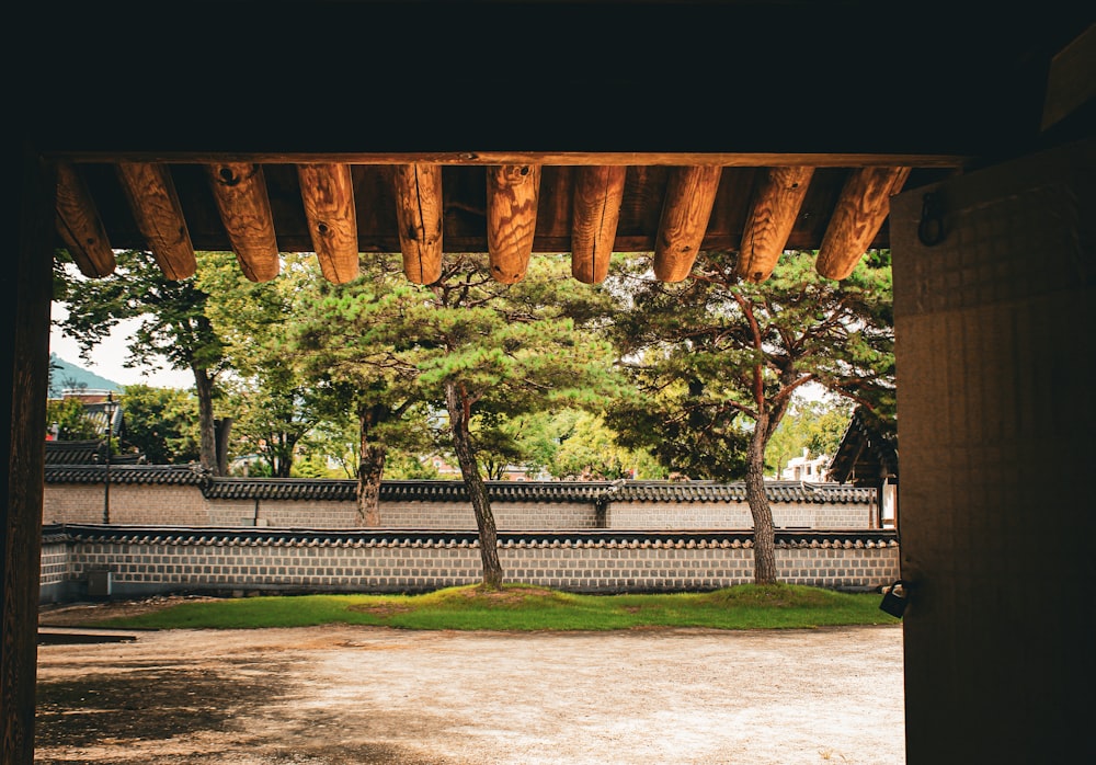 a view of a park through an open door