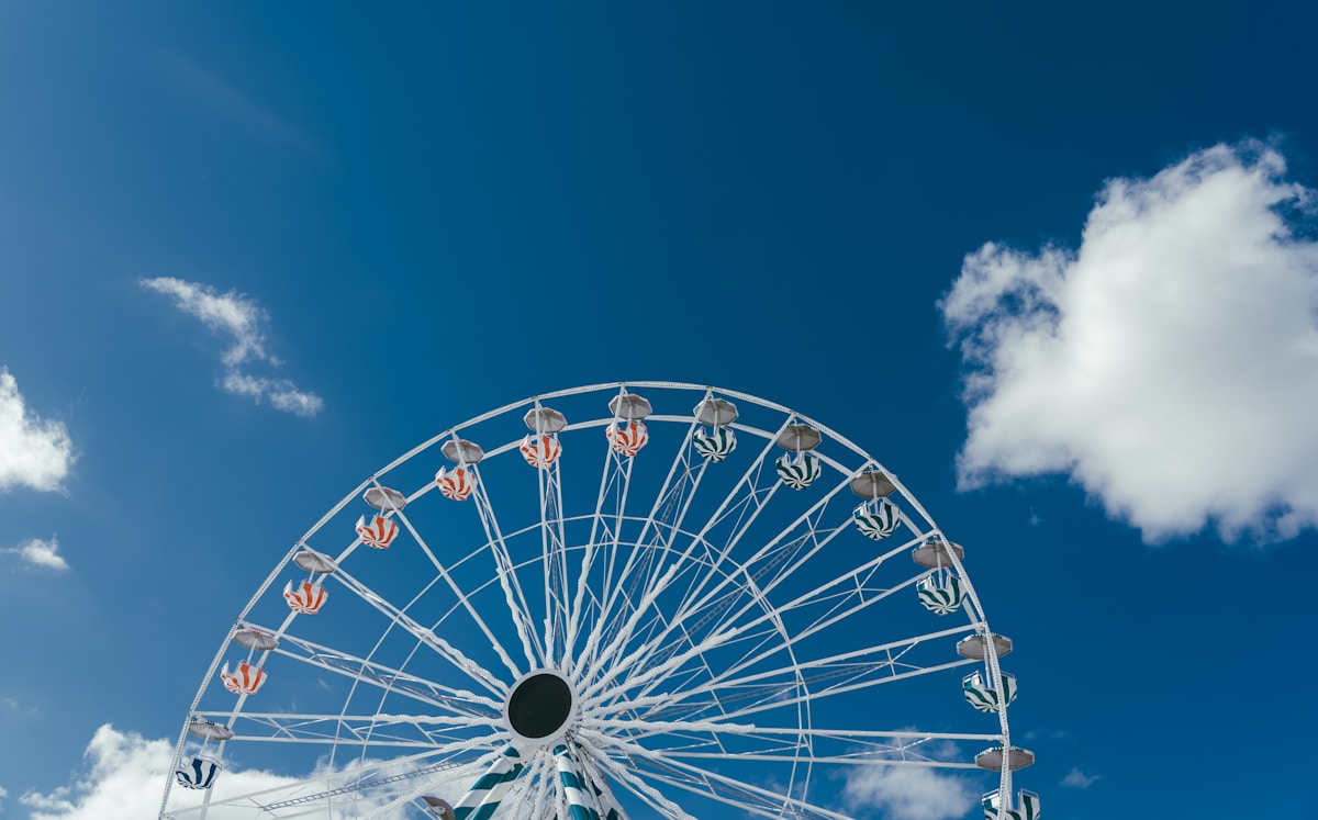 Ferris wheel against a blue sky at a summer county fair like the Deschutes County Fair in Redmond, Oregon