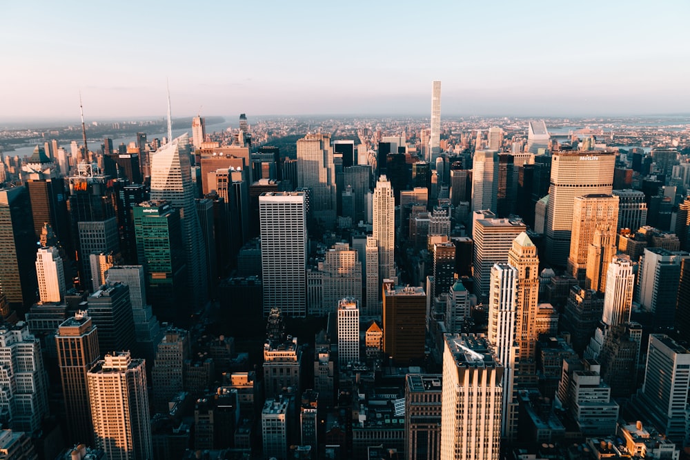 an aerial view of a city with tall buildings