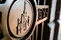 Close-up of detailed metalwork on a decorative security gate.