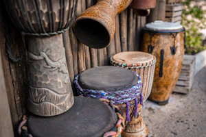 a group of wooden drums sitting next to each other