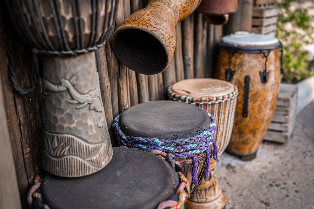 a group of wooden drums sitting next to each other