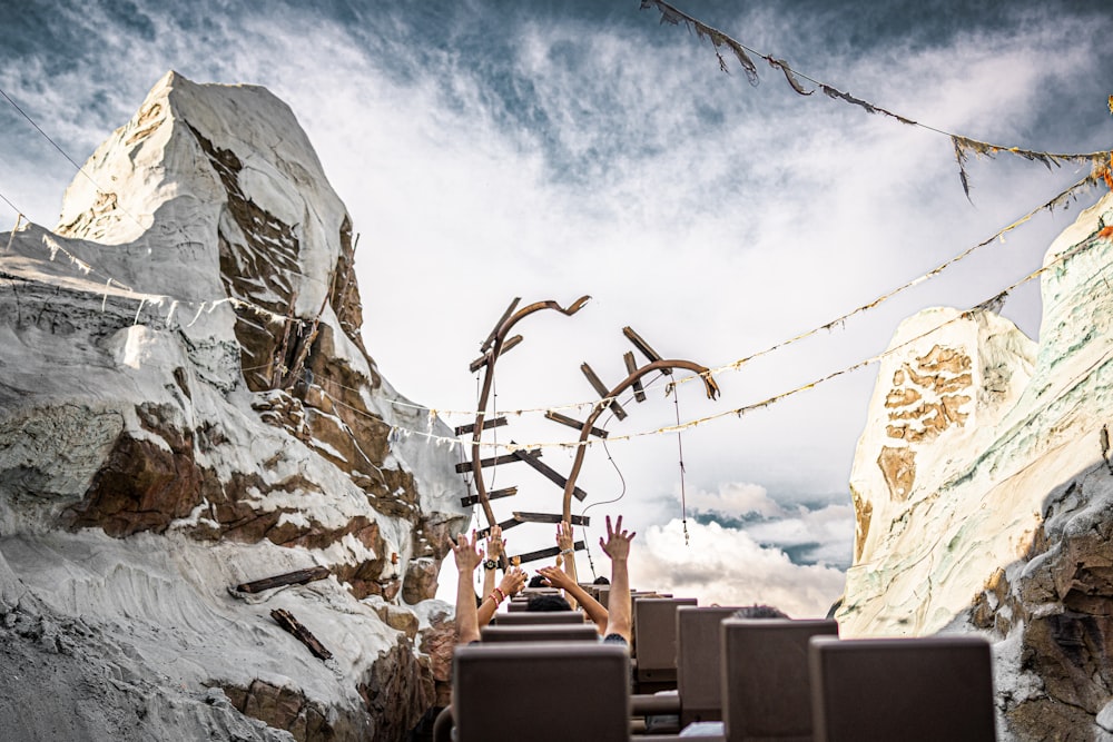 a group of chairs sitting in front of a mountain