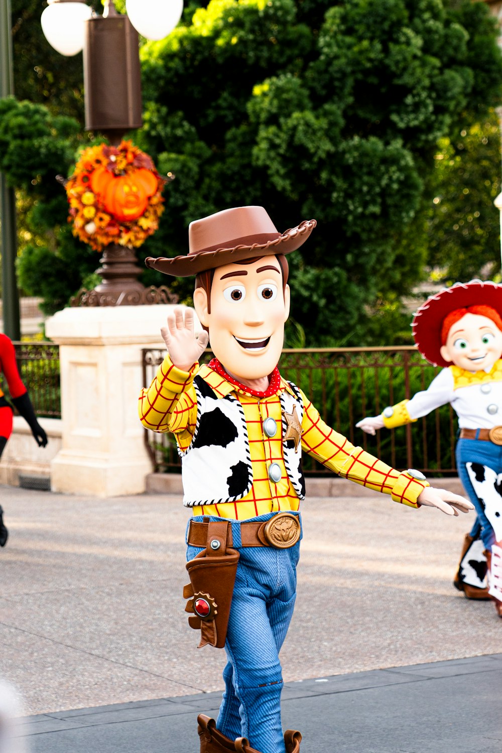 a man in a toy story costume walking down the street