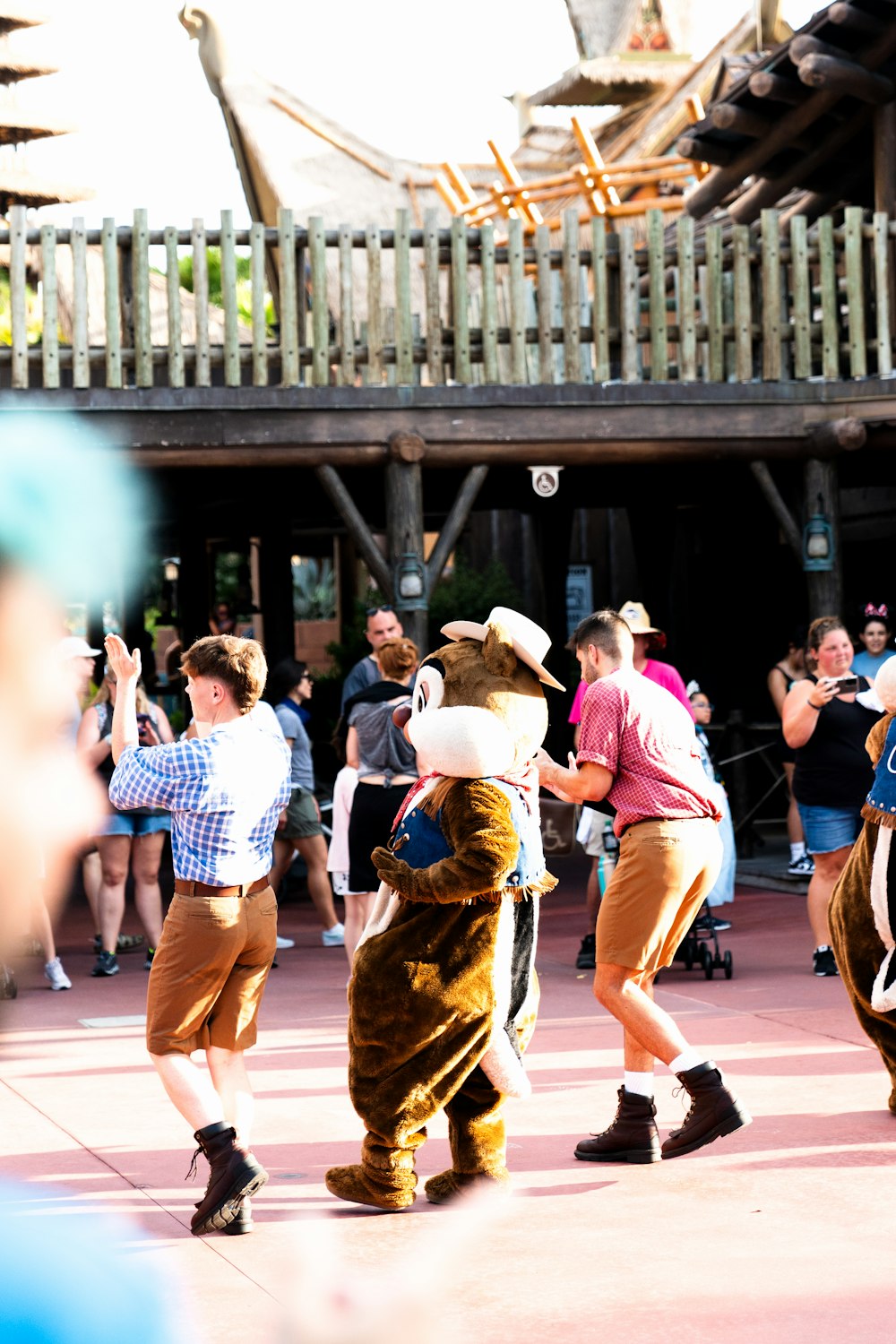 a group of people standing around each other