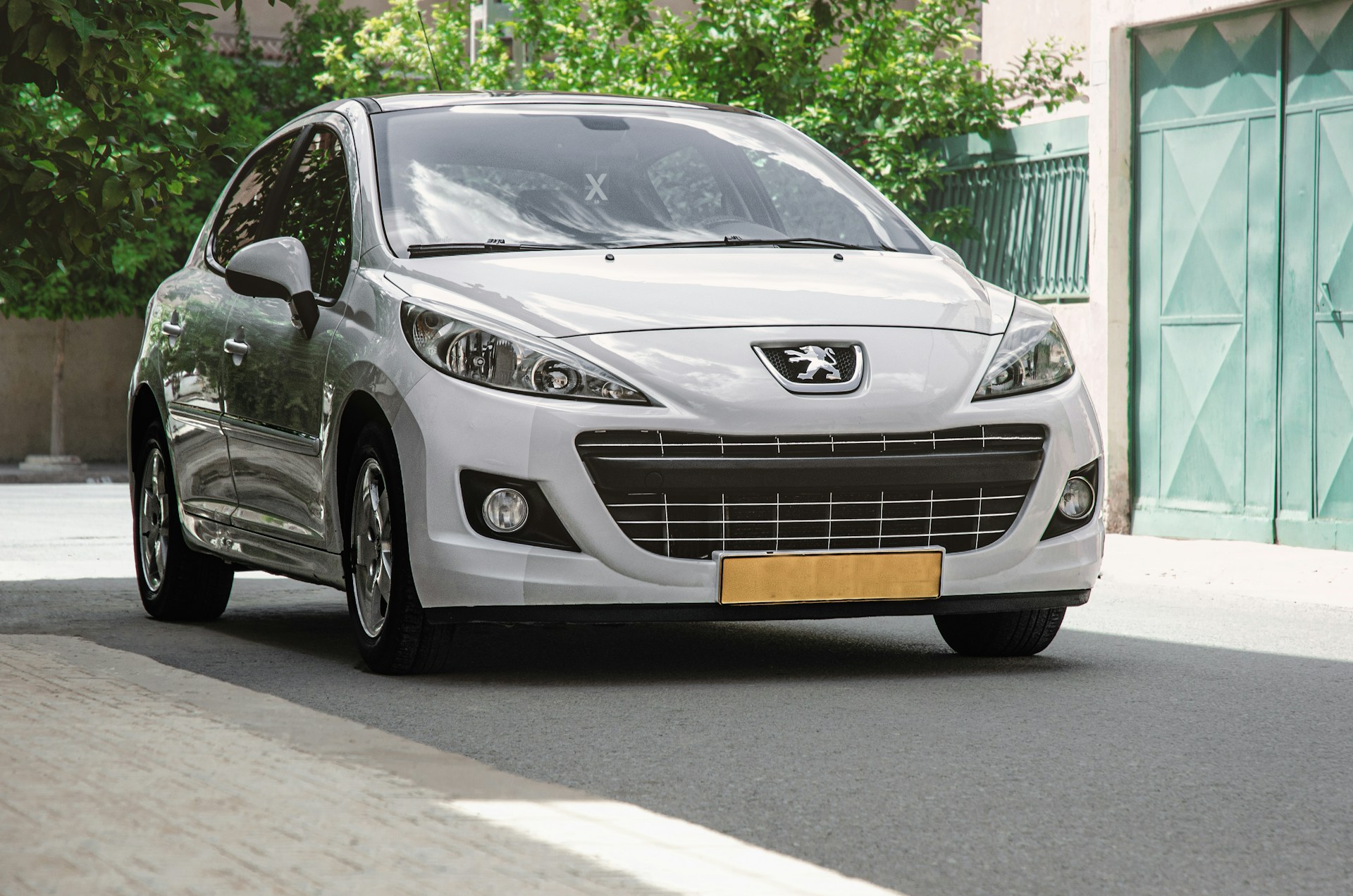 woman wearing yellow long-sleeved dress under white clouds and blue sky during daytime