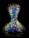 A vibrant and intricate glass sculpture composed of numerous swirling, curly elements in shades of blue, yellow, and green. The structure resembles an hourglass form, with the glass components appearing almost luminous against a dark background.
