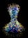 A vibrant and intricate glass sculpture composed of numerous swirling, curly elements in shades of blue, yellow, and green. The structure resembles an hourglass form, with the glass components appearing almost luminous against a dark background.