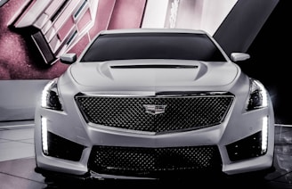 A sleek car with a custom wrap showcasing modern design.