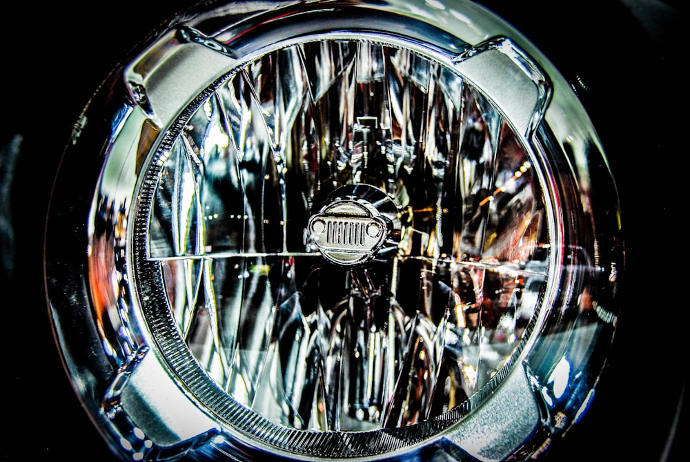 a close up of a clock face on a black background