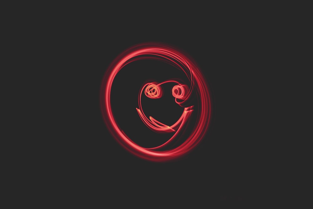 ein roter Kreis mit einem Smiley darauf