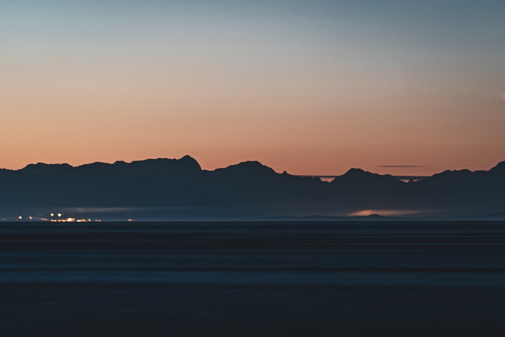 a plane flying over a large body of water