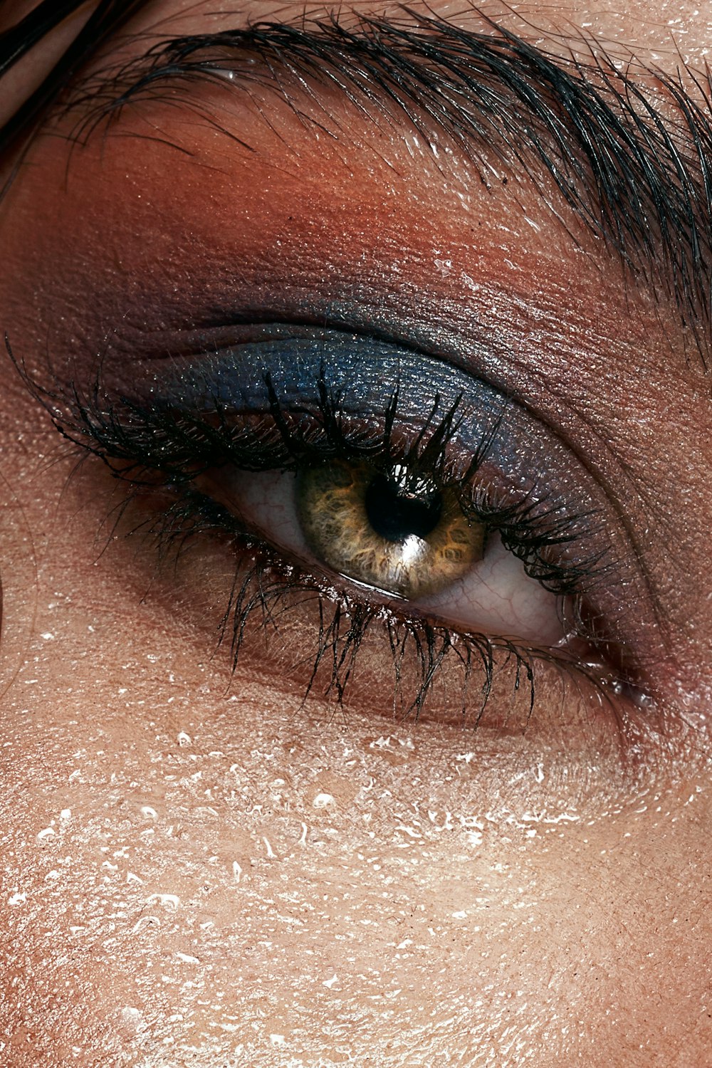 a close up of a person's eye with makeup