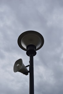 a lamp post with a light on top of it