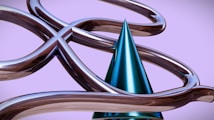 Intertwining metallic tubes form a complex structure surrounding a glossy blue cone. The background is a soft pastel purple, contrasting with the industrial feel of the metal.