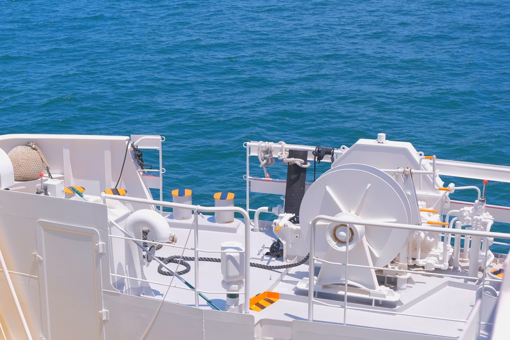 a large white boat in the middle of the ocean