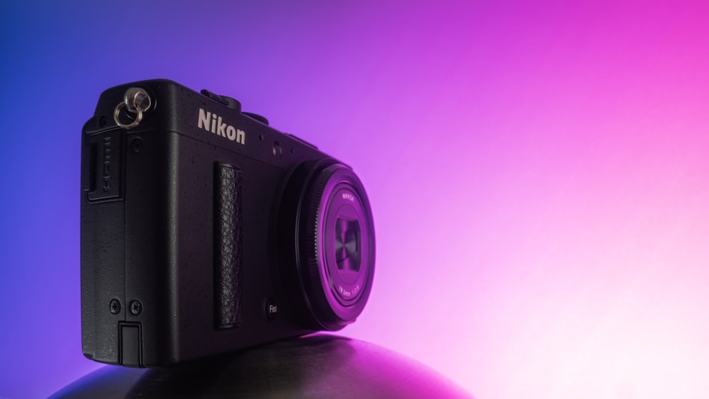 A digital camera sitting on top of a ball photo – Free Camera Image on  Unsplash