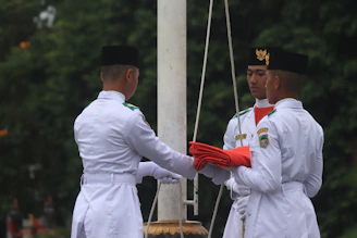 Post members assisting youth during a flag etiquette workshop.
