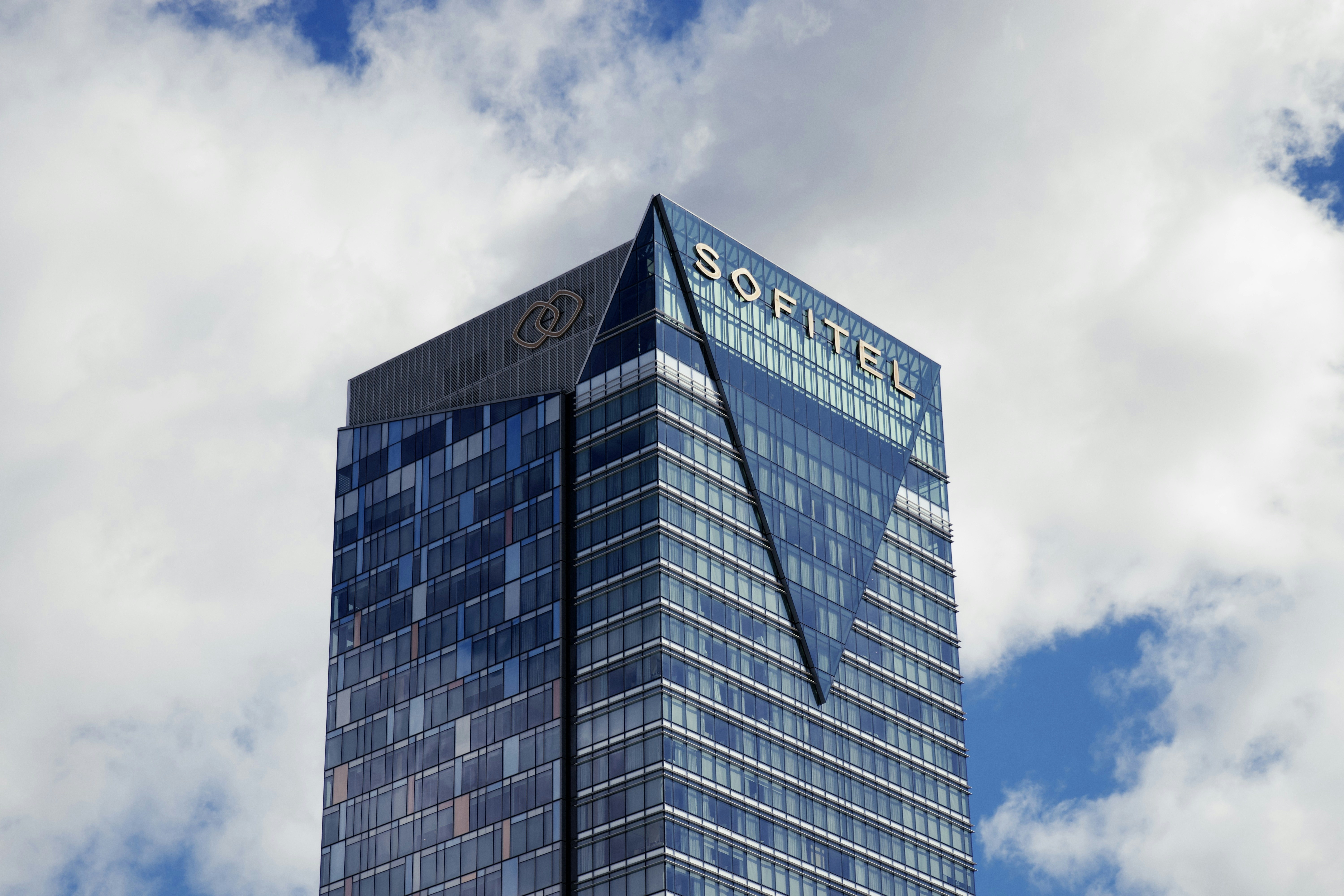 a very tall building with a sky background, 