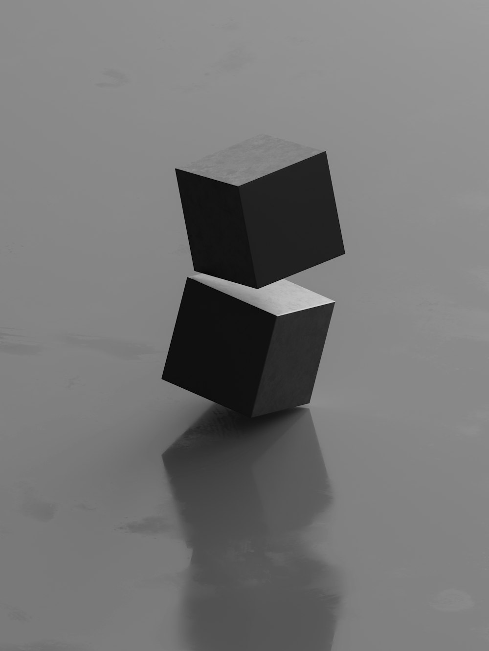 a black and white photo of a cube