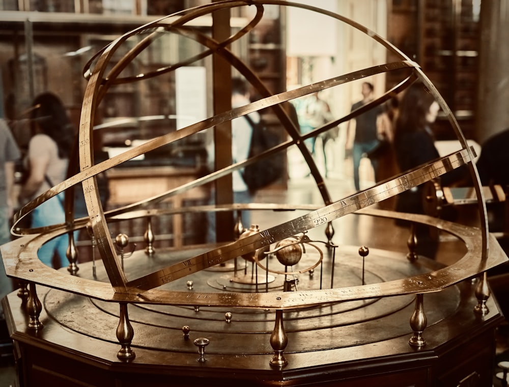 a large metal object sitting on top of a wooden table