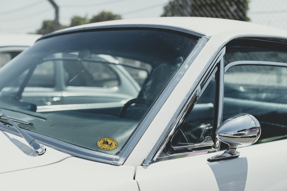 a close up of a car's side mirror