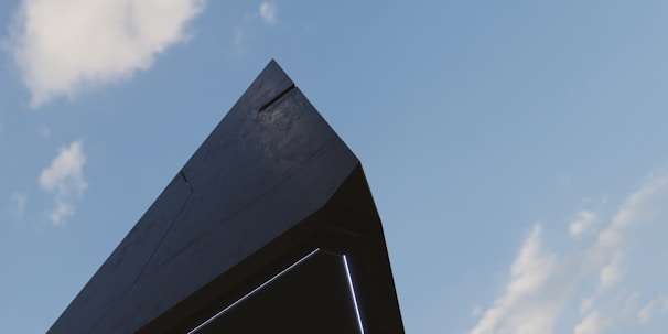 A sleek 3D architectural rendering showcasing a modern building with sharp lines and realistic lighting.