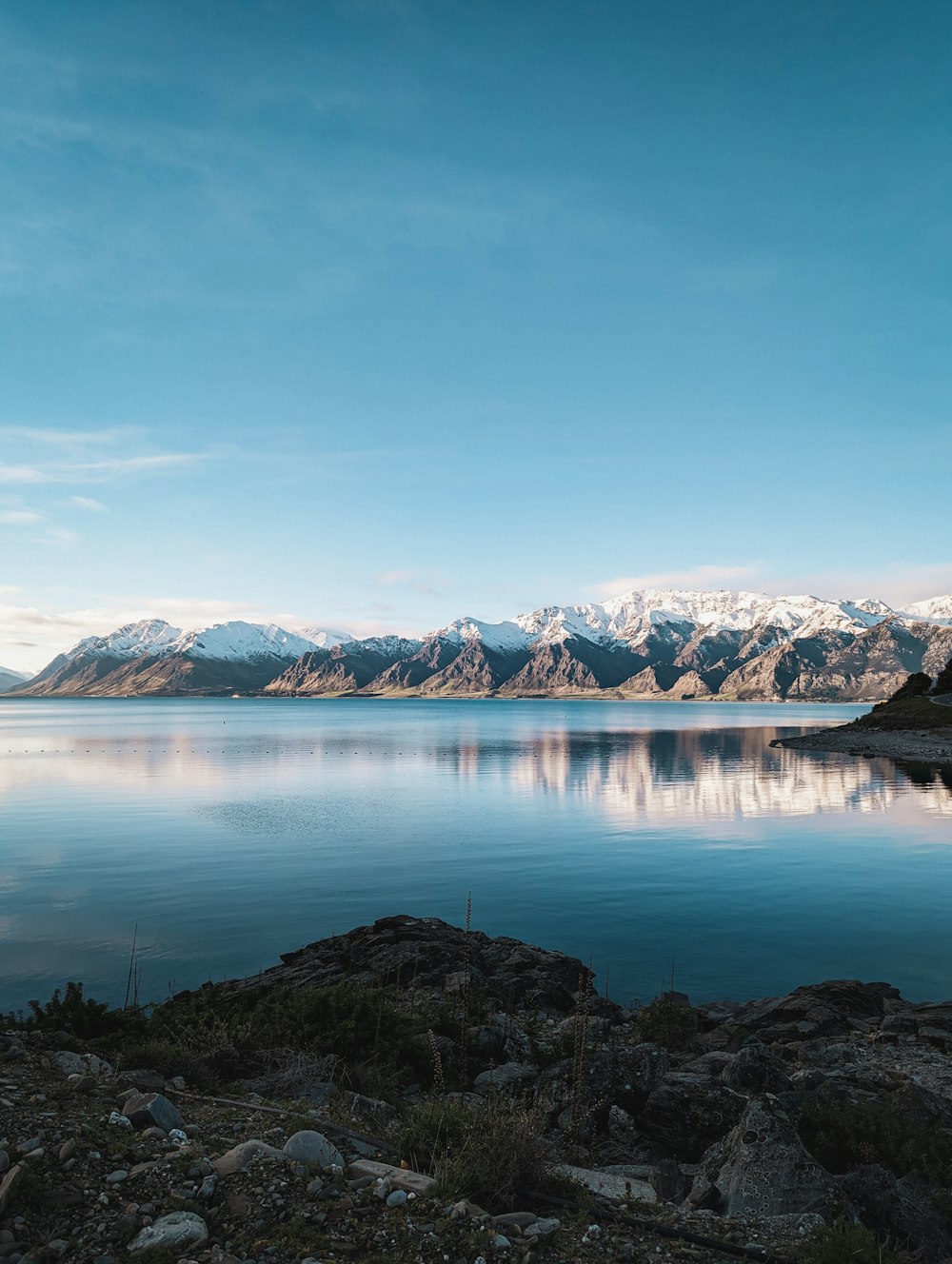 a large body of water surrounded by mountains