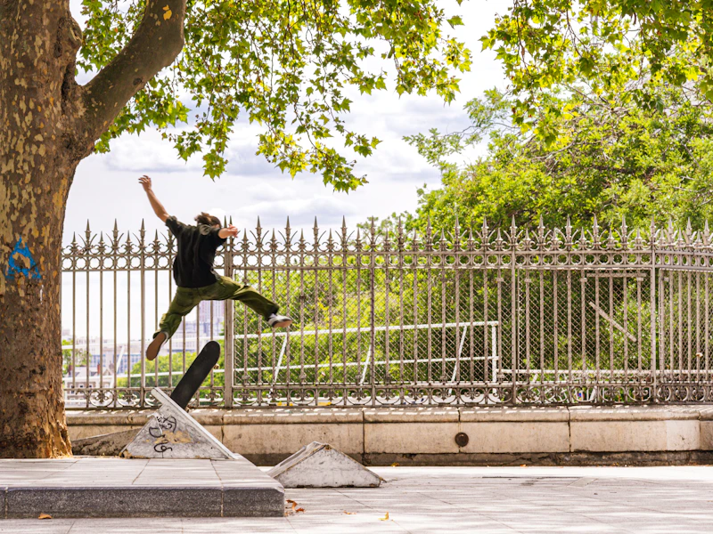 skateboarder riding up a ramp