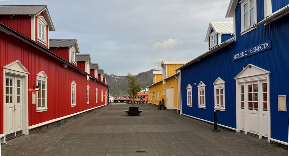 a row of colorful houses on a street