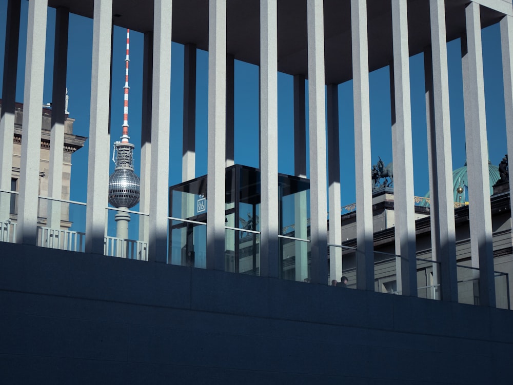 a view of a building through a fence