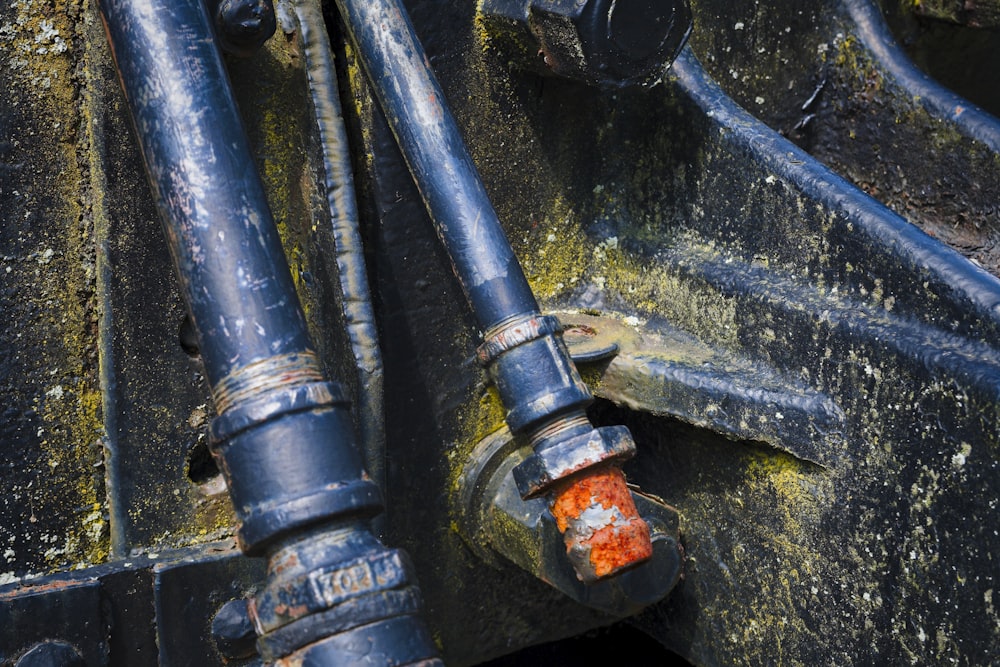 a close up of a rusted metal object