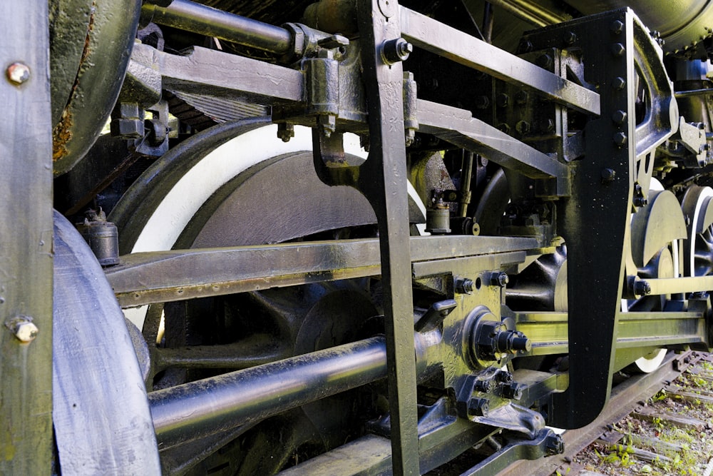 a close up of the wheels of a train