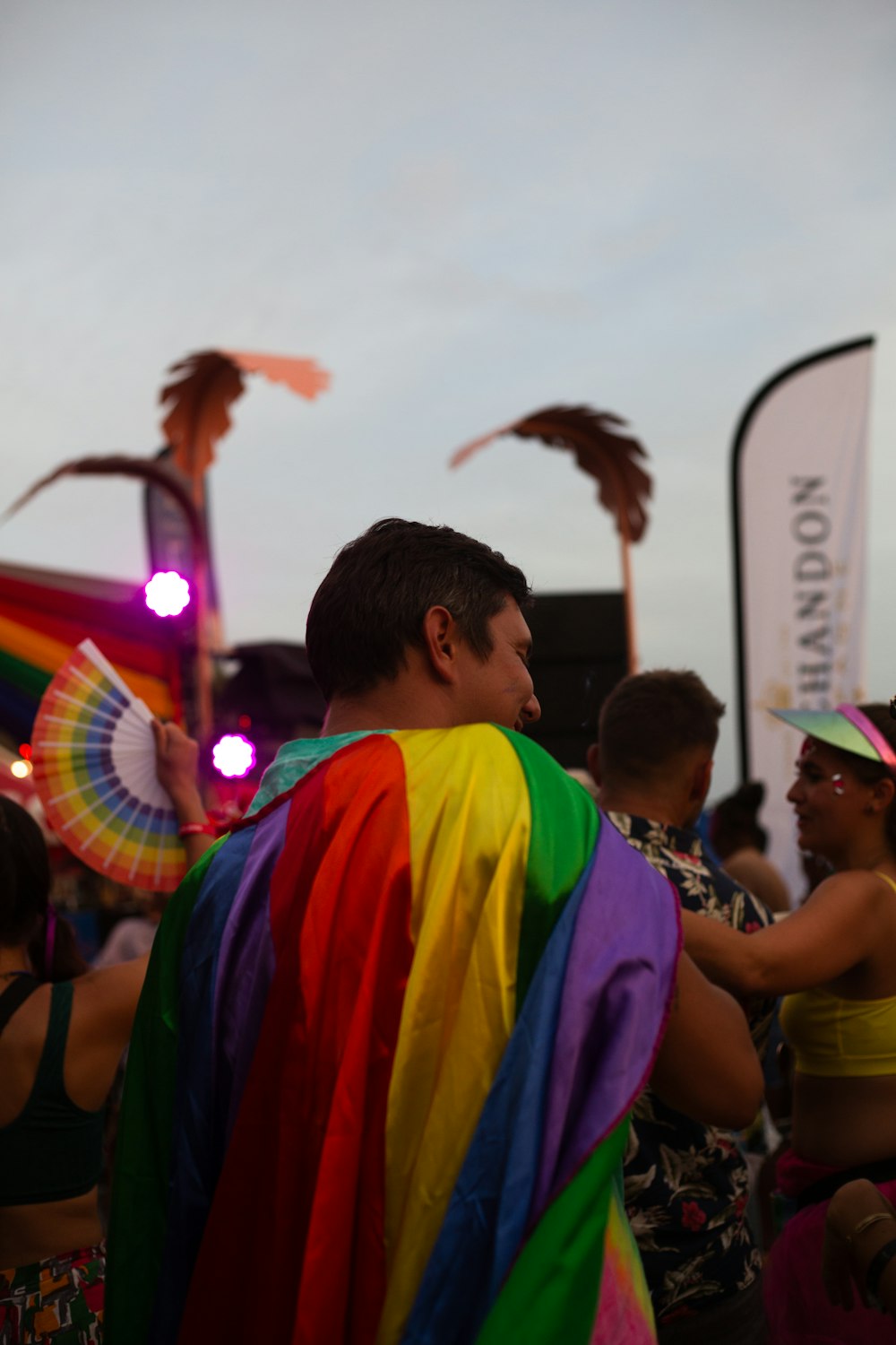 a group of people standing around each other