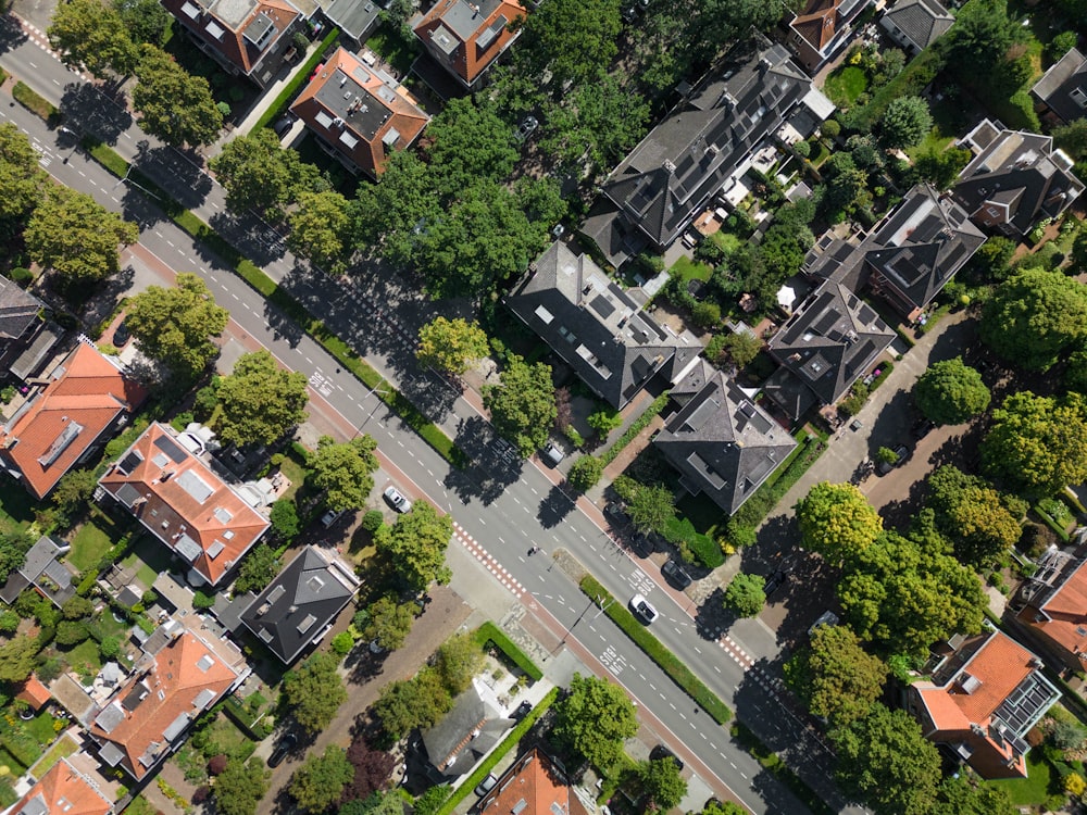 an aerial view of a city with lots of houses