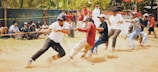 A lively tug of war with teams pulling hard, faces full of determination