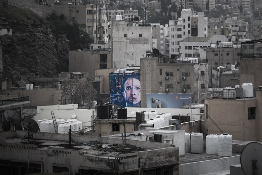 a picture of a woman on a building in a city