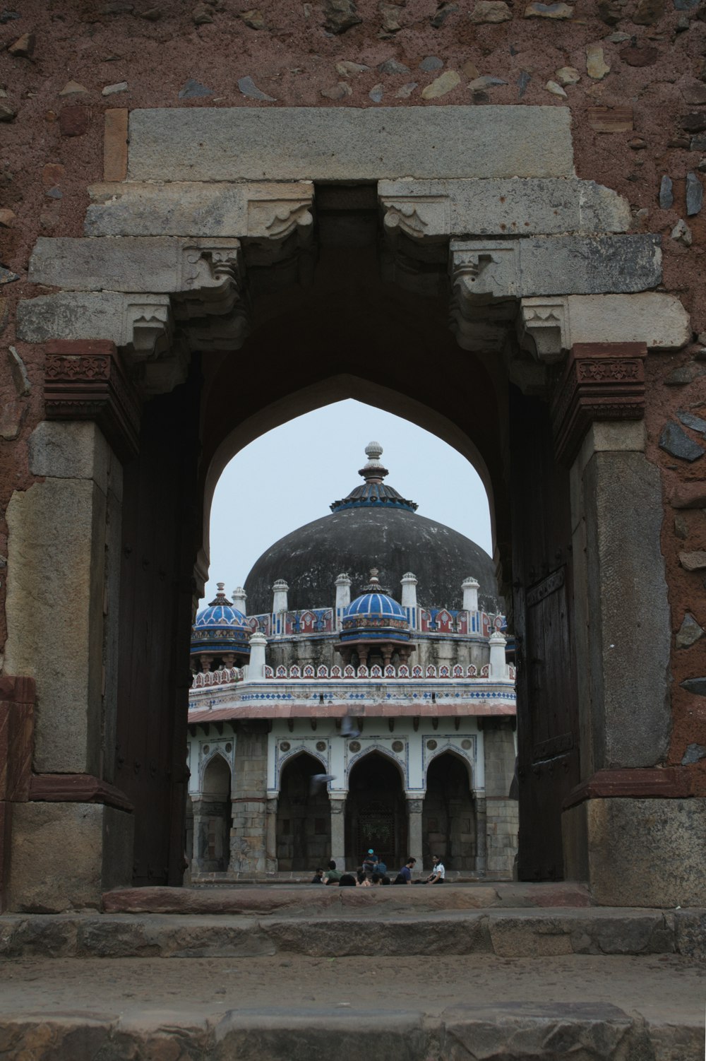 a view of a building through an archway