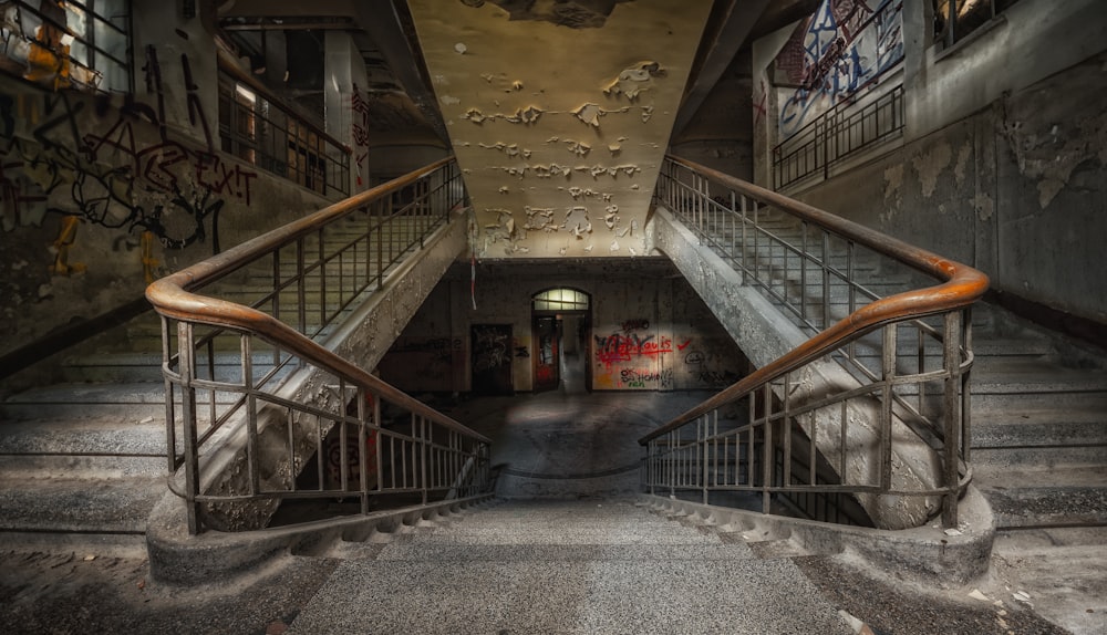 a set of stairs with graffiti on the walls