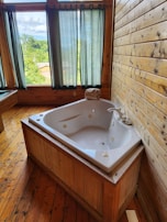 A spa jetted walk-in tub with comfortable seating and easy-access door.