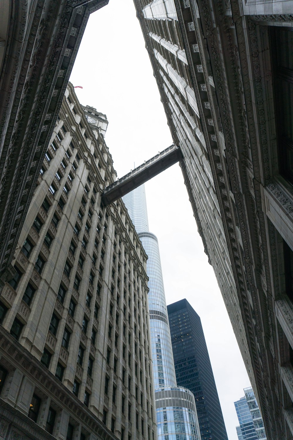 looking up at a very tall building in a city