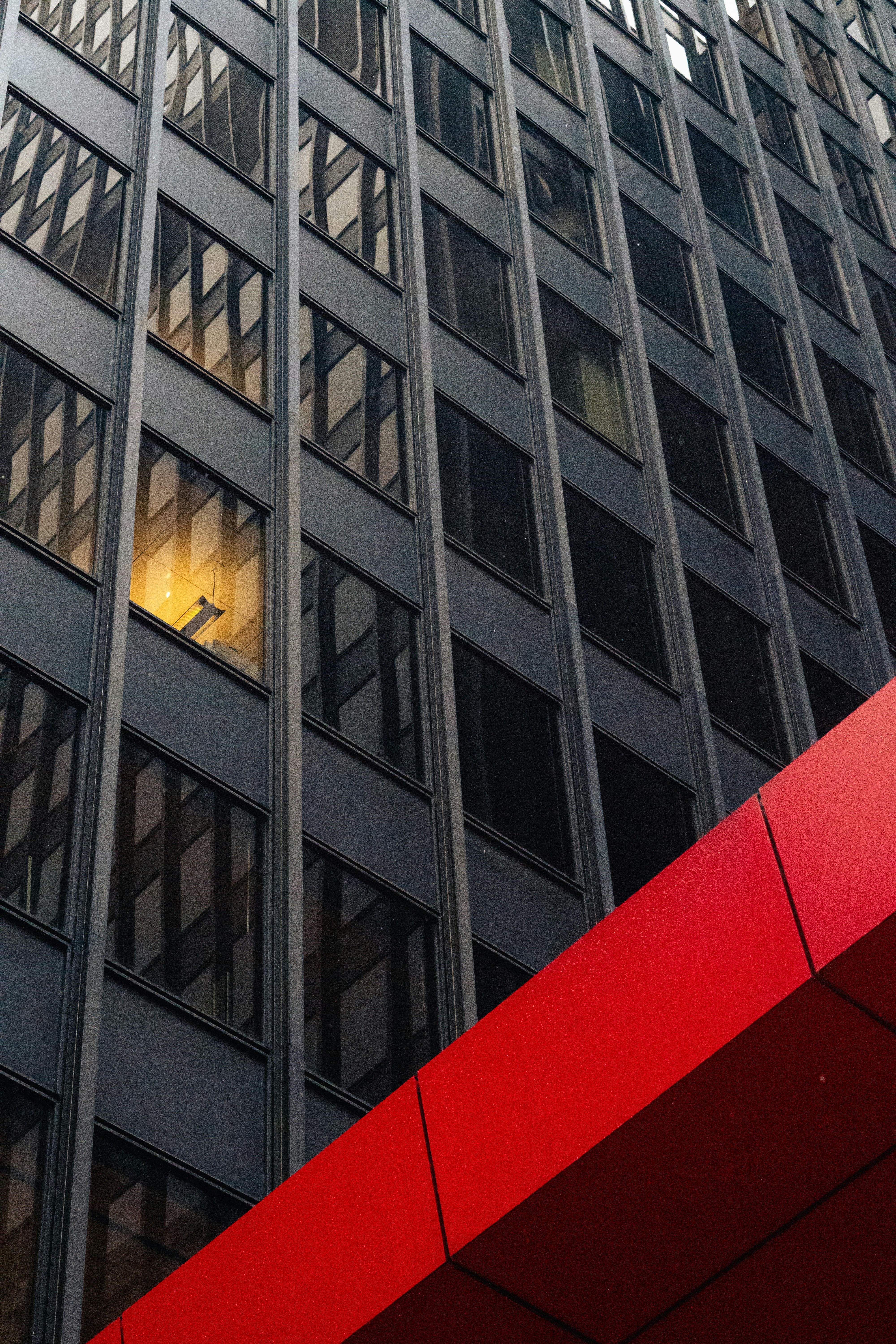 a tall building with a clock on the side of it