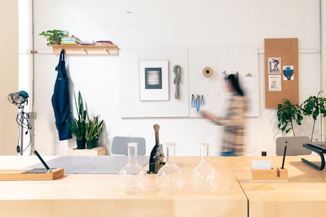 An organized workspace featuring lab notebooks and reagents.