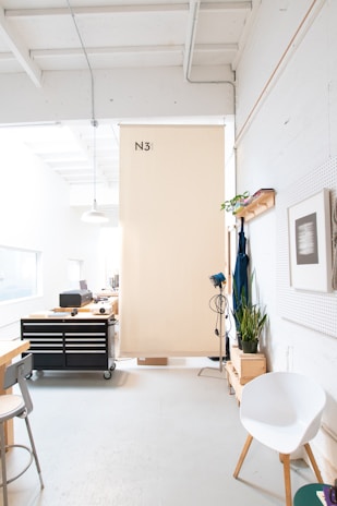 A clean, modern workspace with tools for chimney sweeping and water damage restoration.