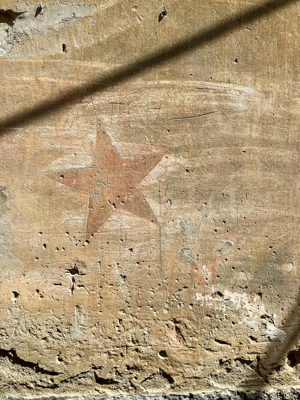 a star painted on the side of a building