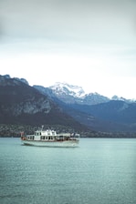 a large boat floating on top of a large body of water