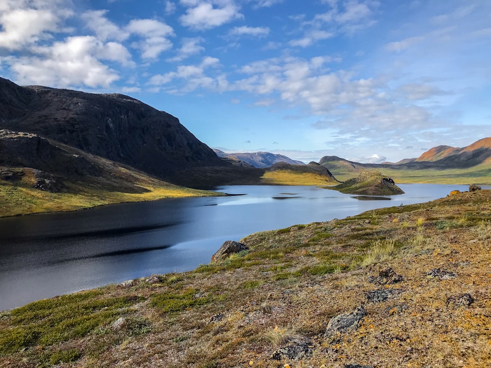 a large body of water surrounded by mountains