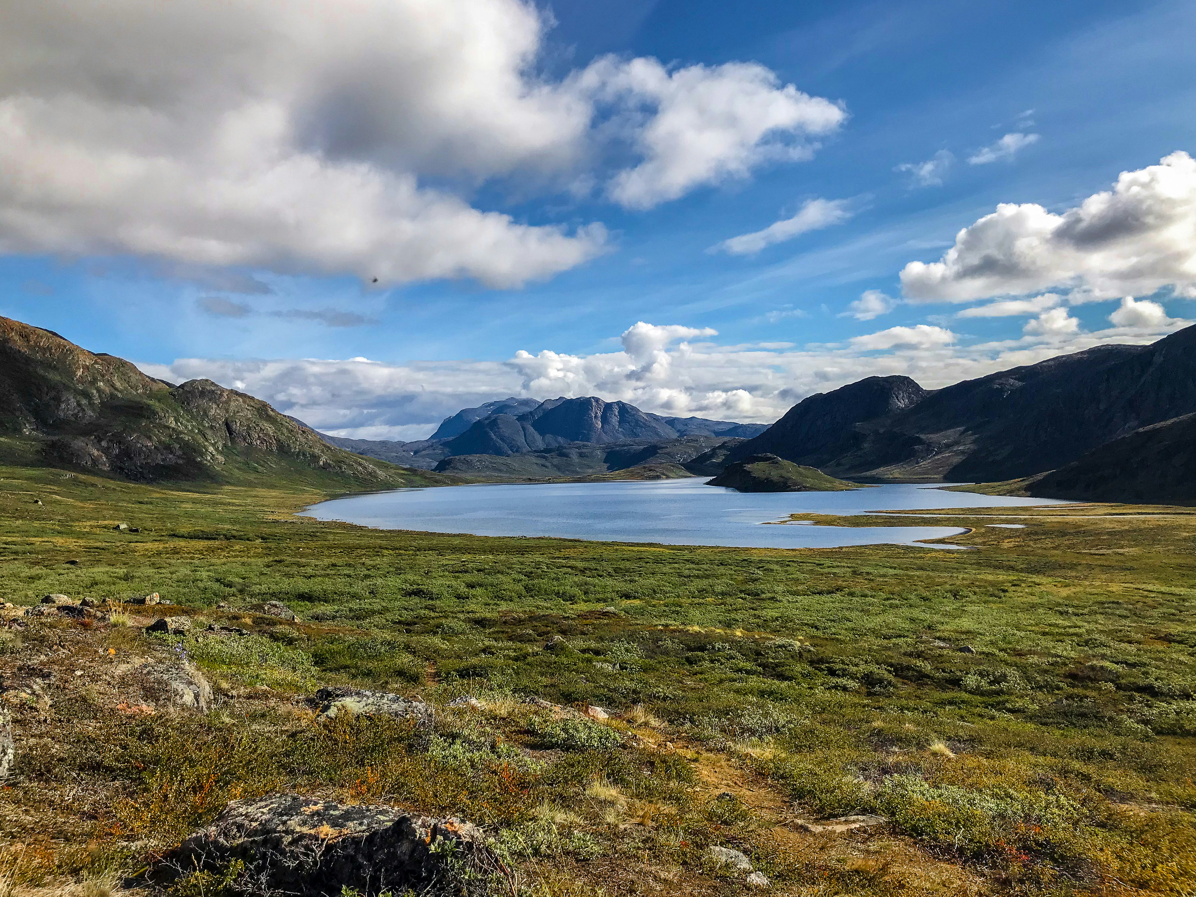 a large body of water surrounded by mountains